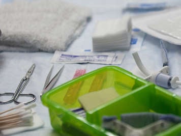 Some of the items used when caring for a tracheostomy stoma.