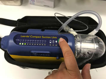 Settings on a portable suction machine.