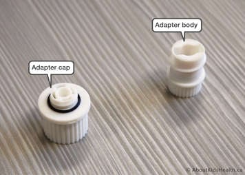 Capsule shredder showing the adaptor body and the adaptor cap