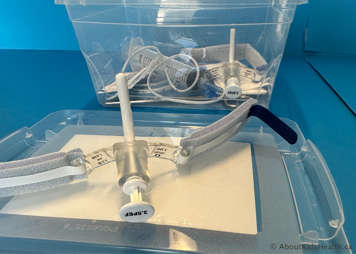 Placing the tracheostomy tube upright to keep it clean
