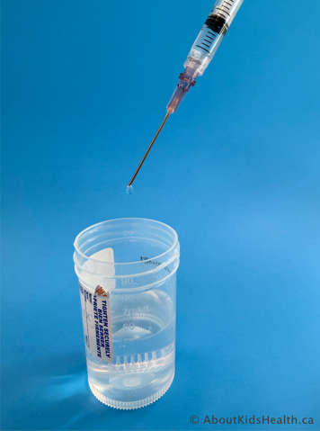 adding tobramycin to saline solution in sterile container