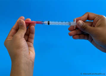 syringe with needle tip
