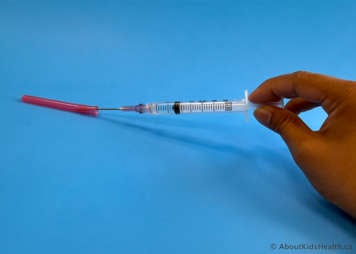 removing cap from needle tip