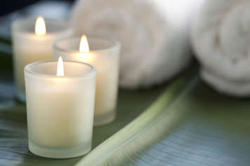 Three lit candles