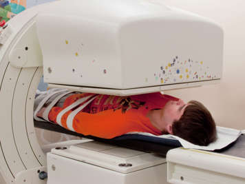 Boy getting a bone scan