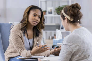 A caseworker helping someone